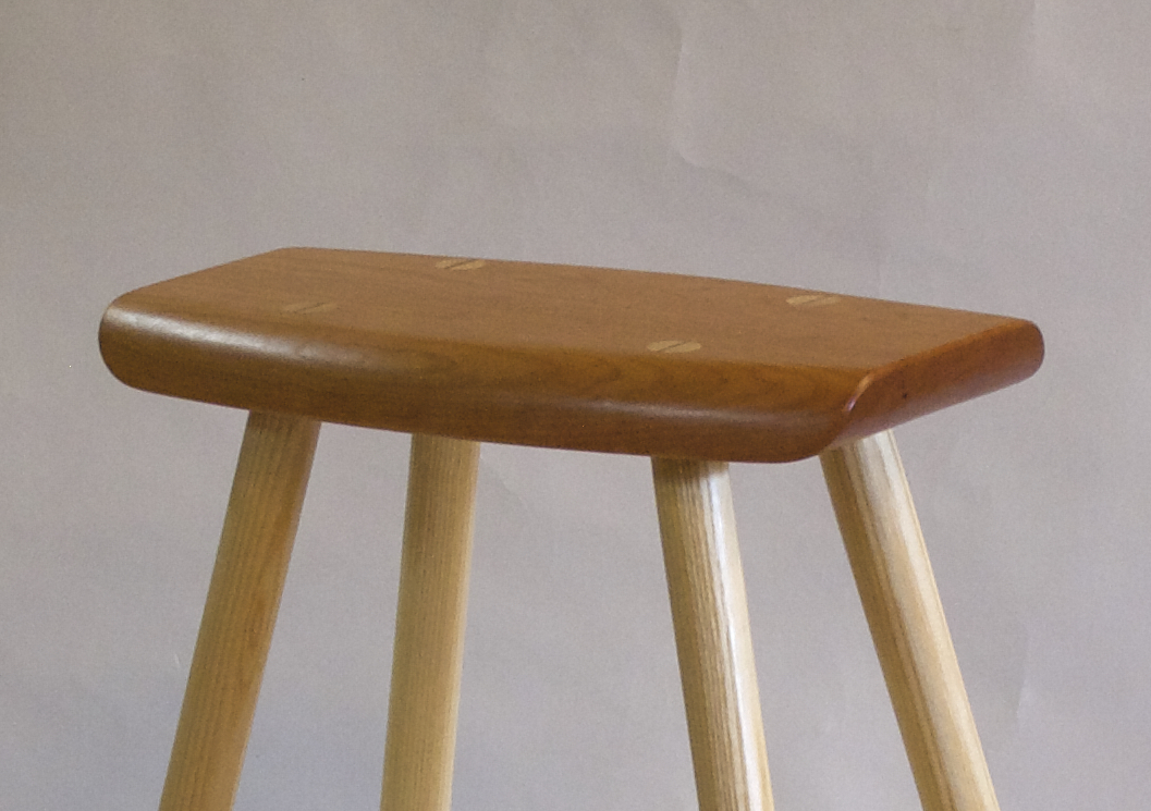 seat detail of high work stool made of cherry and ash by Timothy Clark